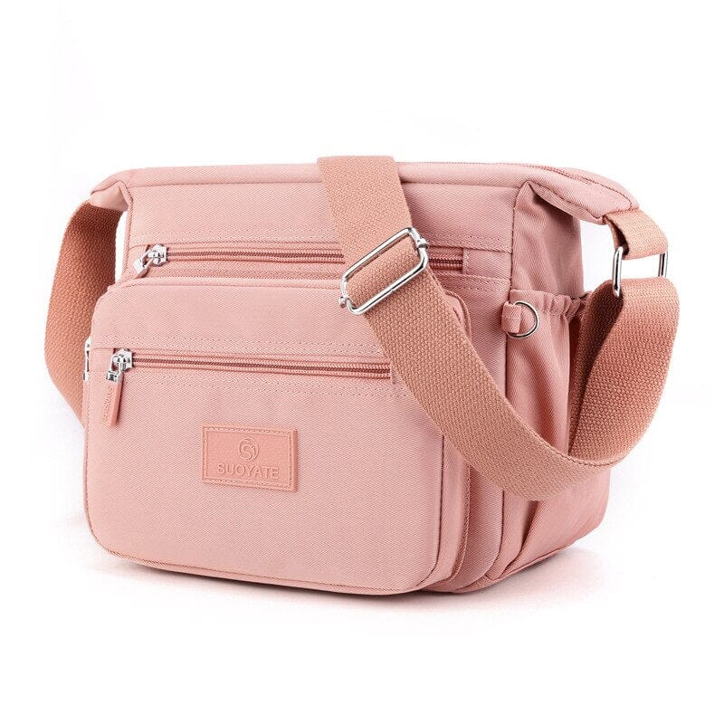 Bolsa Compacta em Nylon Resistente à Água e Fechamento em Zíper Bolsa Compacta em Nylon Resistente à Água e Fechamento em Zíper Importe Go Rosa 